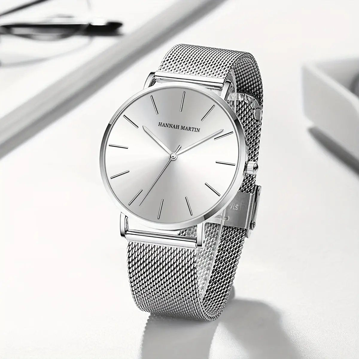 Classic watch with polished steel finish, understated elegance