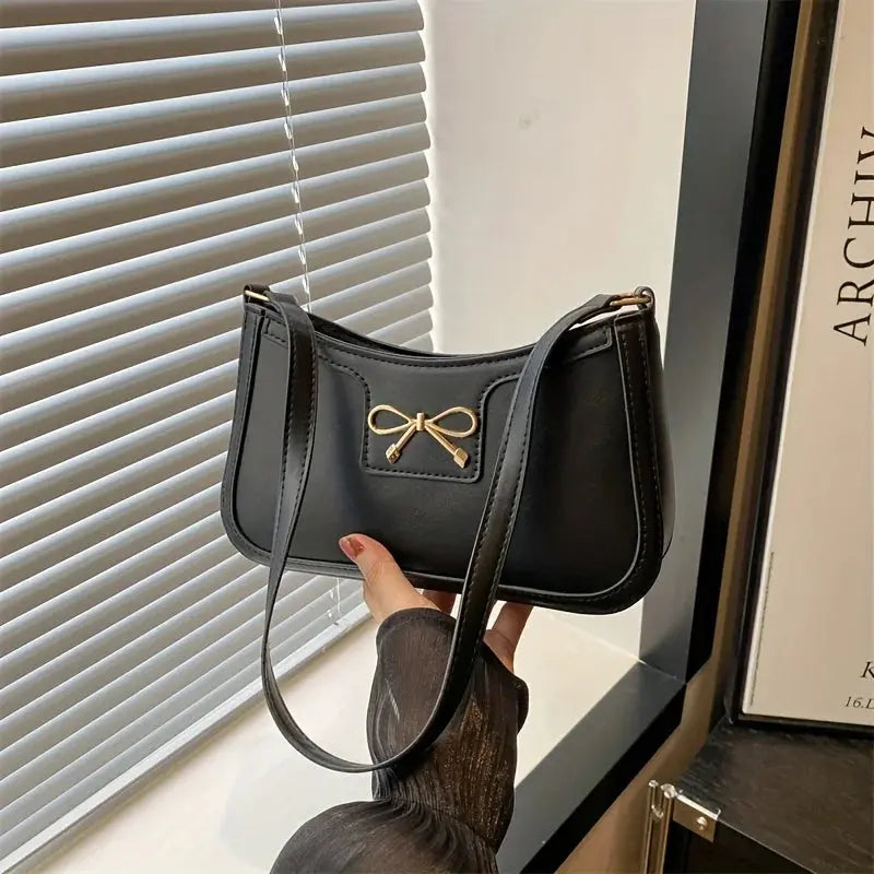 90s Baguette bag with a sculpted silhouette, an everyday essential